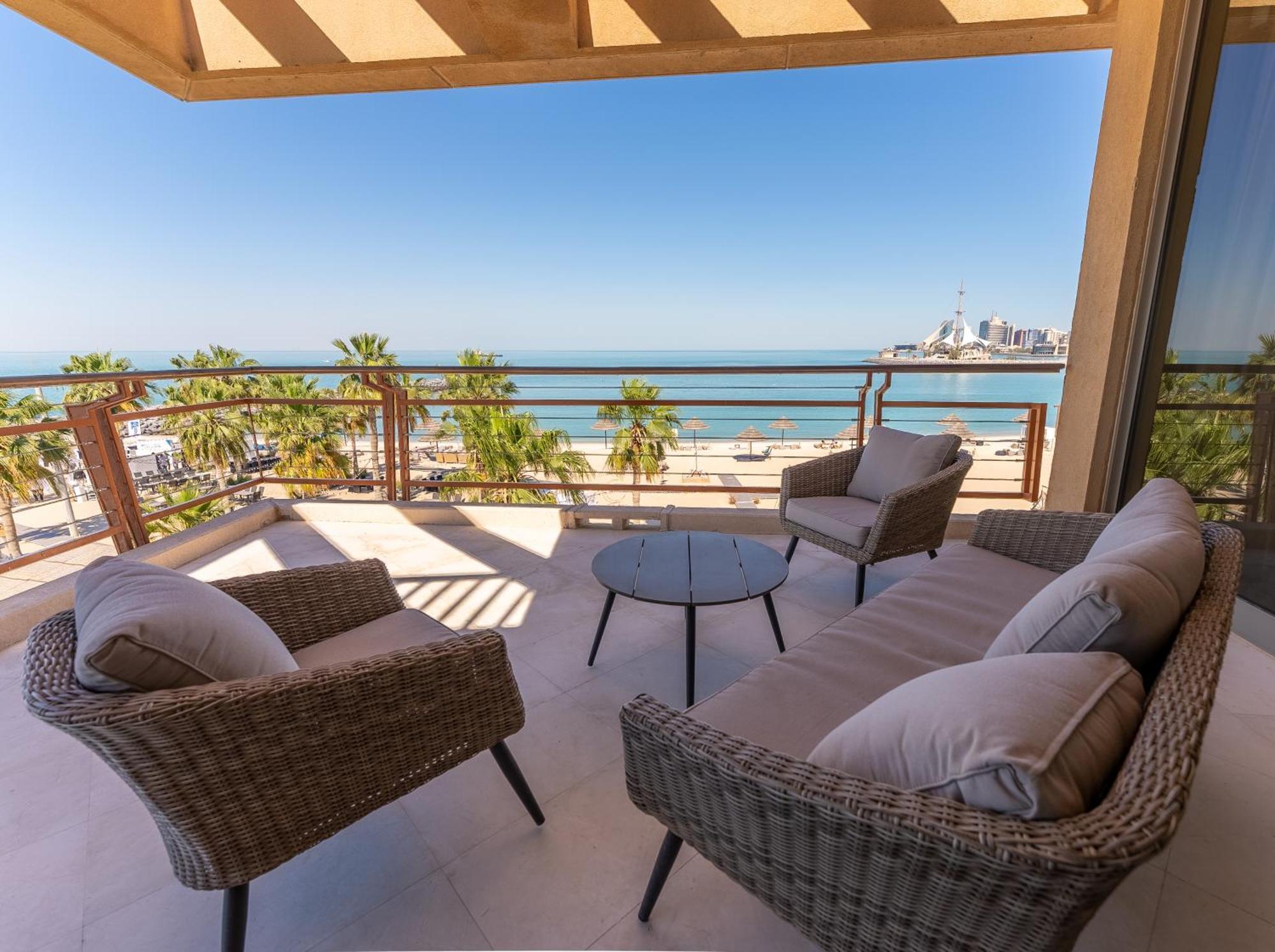 Marina Hotel Kuwait City Exterior photo Balcony of a suite at the Hilton Ras Al Khaimah