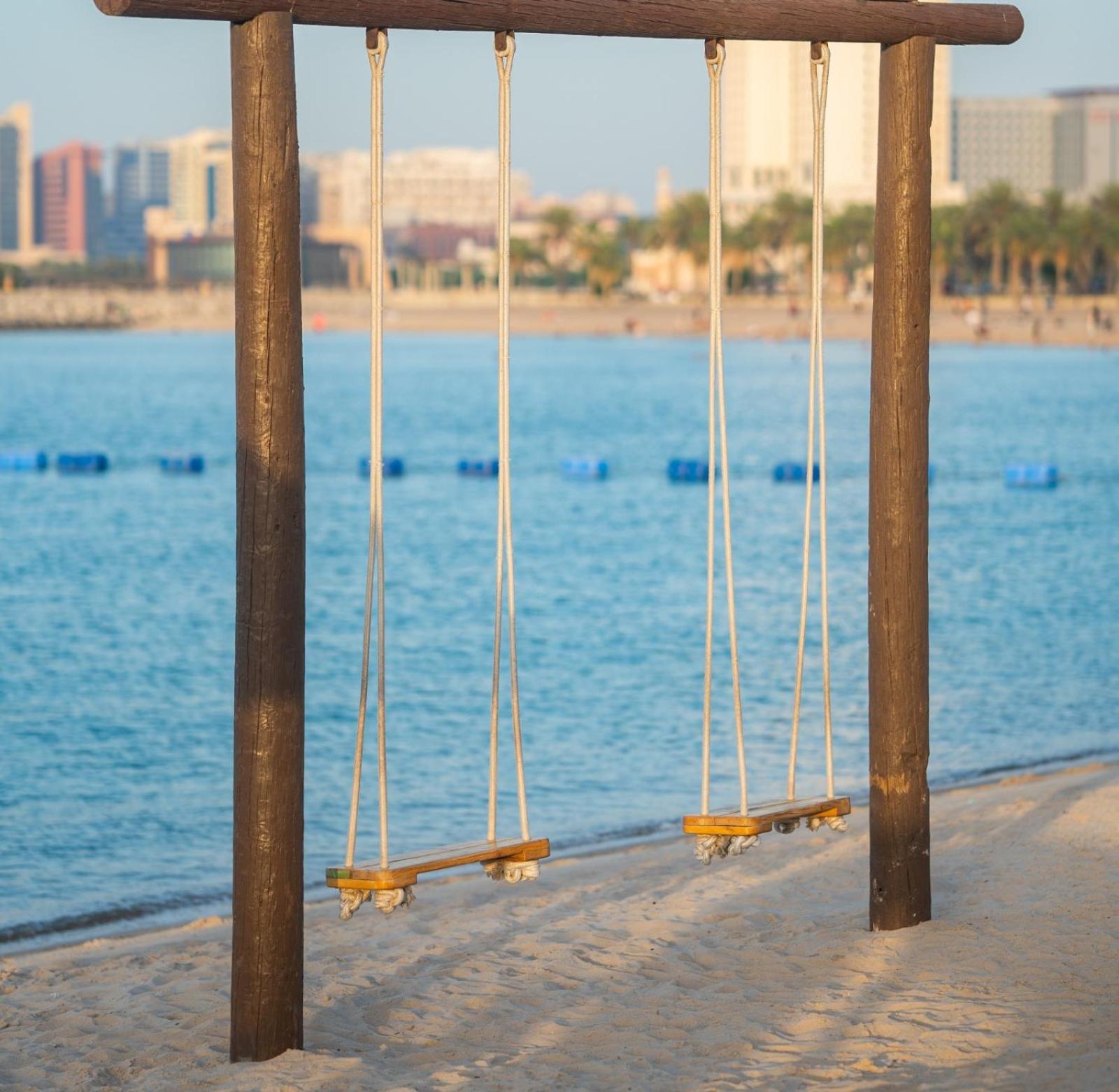 Marina Hotel Kuwait City Exterior photo Swinging bridge at Al-Shaab Beach