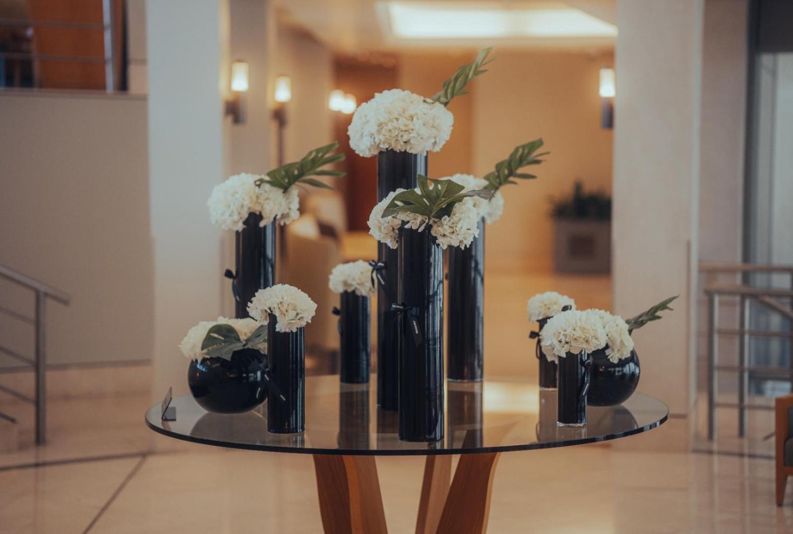 Marina Hotel Kuwait City Exterior photo Flower arrangement at the entrance of the hotel