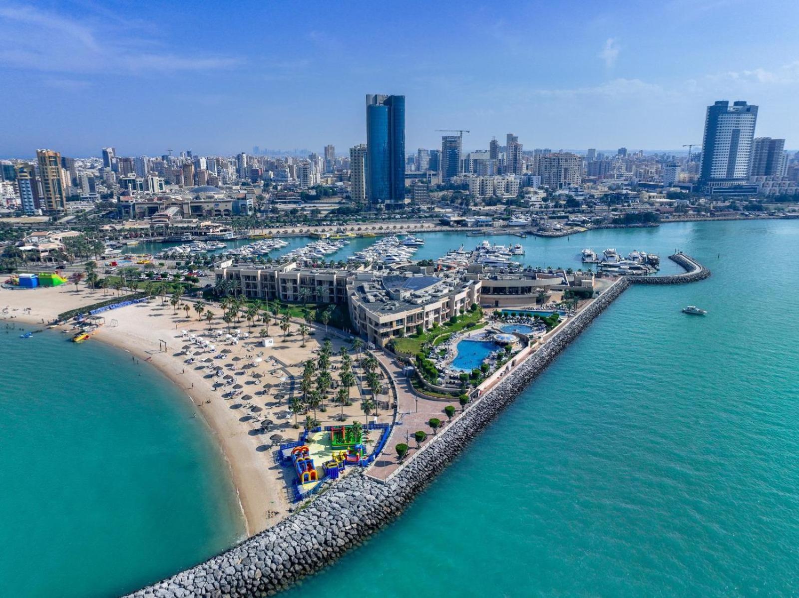 Marina Hotel Kuwait City Exterior photo Aerial view of Al Bandar, Manama