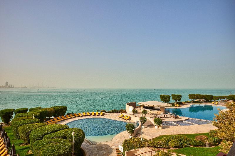 Marina Hotel Kuwait City Exterior photo The swimming pool at the resort